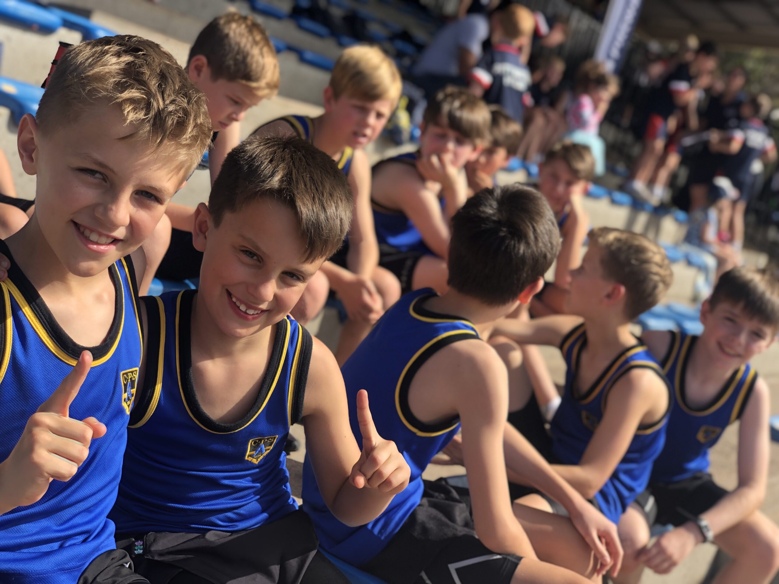 Coogee Prep boys in blue and gold at an inter-school carnival