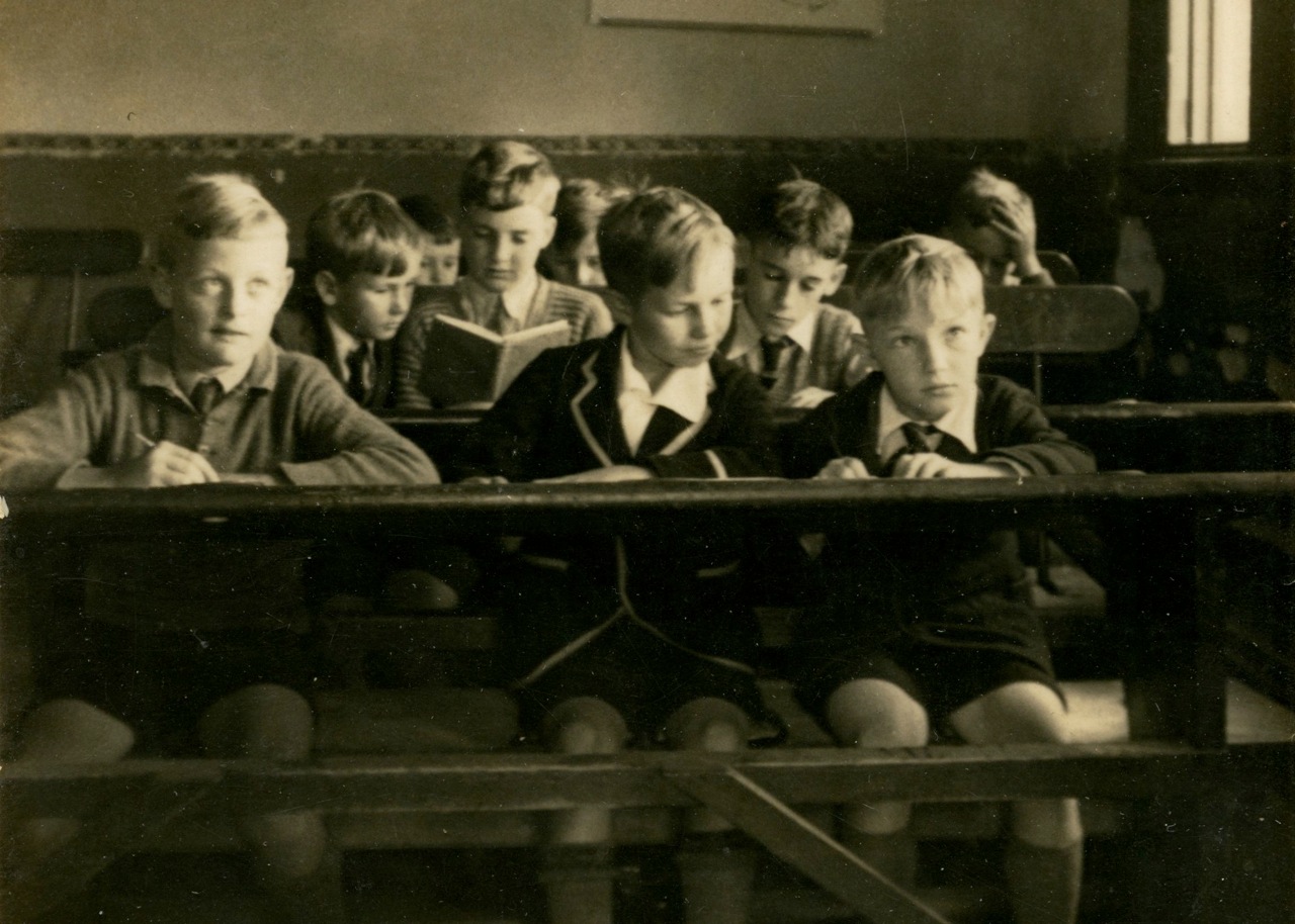 Coogee Prep boys at their desks in a classroom in the 1930s